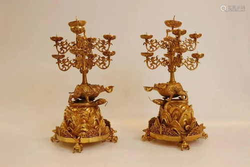 A Pair of Gilt Bronze Candle Holders