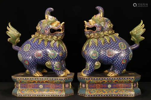 A Pair of Bronze Enamel Mythical Beast Shaped Statues