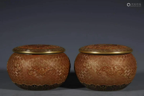 A Pair of Porcelain Tea Leaves Containers