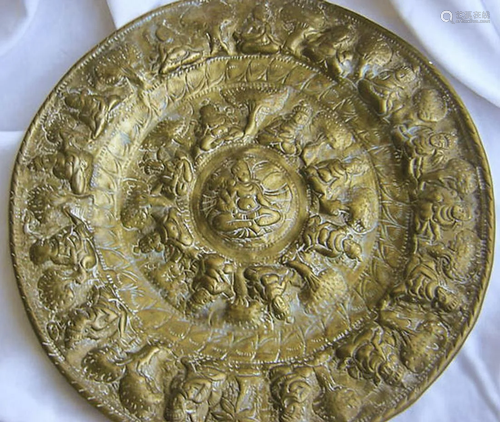 Older Hindu plaque of repousse brass --10.75" in