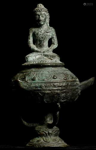 Delightful Javanese censor with a Buddha on