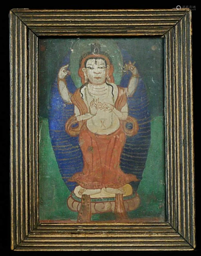 Antique Mongolian thangka in an old frame, which