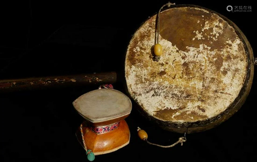 Two vintage/old Chinese drums -- largest has a