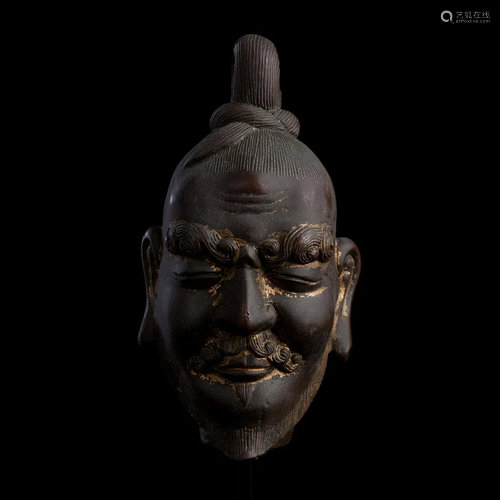 Rare, intense, and refined solid cast antique head of