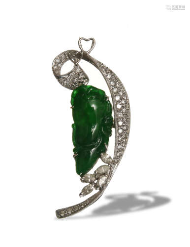 A Chinese carved jade, diamond, and eighteen karat gold pend...