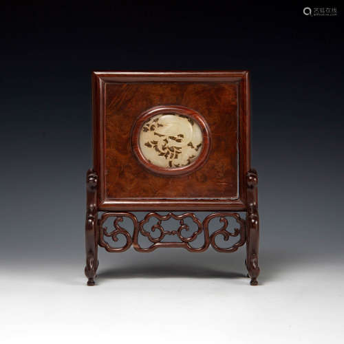 A Chinese hardwood table screen with white jade carved plaqu...