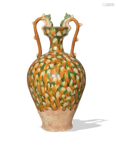 A partially glazed Chinese sancai amphora with dragon handle...