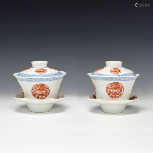 A pair of Chinese lidded cups with saucers  Republic period ...