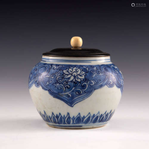 A Chinese blue and white jar with wooden lid  Kangxi period ...