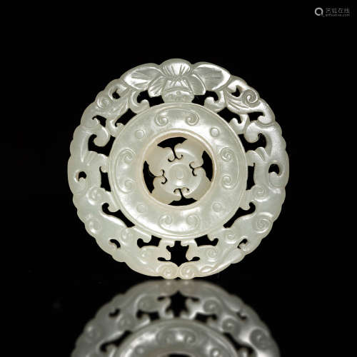 A Chinese white jade plaque with rotating disc  18th century...