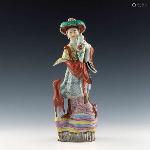 A Chinese famille rose figure of a court lady with a deer  R...