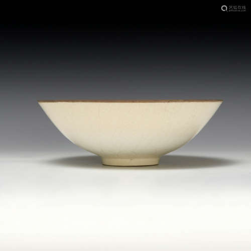 A Chinese ding-style white glazed and incised bowl  Ming dyn...