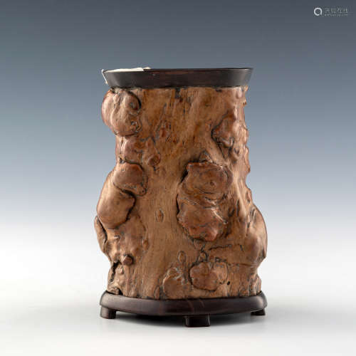 A Chinese brush pot carved from a tree root  19th century or...