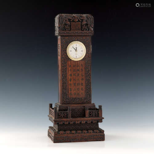 A Chinese carved wood clock  19th century 十九世紀 硬木雕碑鑲...