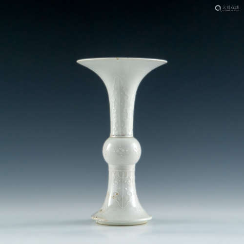 A Chinese white glazed gu-form vase  19th century or earlier...