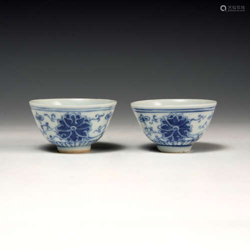 A pair of Chinese blue and white porcelain lotus cups  Xuant...