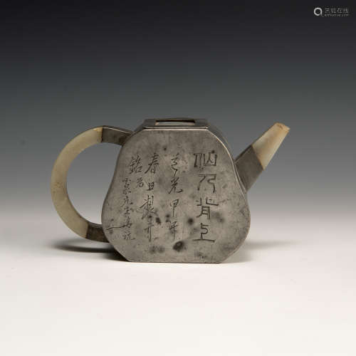 A Chinese pewter encased Yixing Zisha teapot with jade spout...