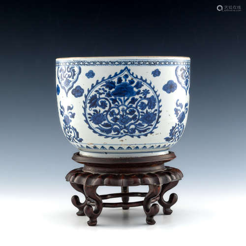 A Chinese blue and white bowl with wooden stand  Kangxi Peri...