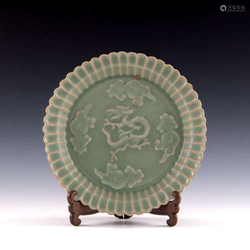 A Chinese Longquan celadon ‘Dragon And Clouds’ plate  Yuan o...