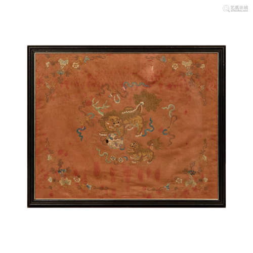 A Chinese gold thread guardian lion silk panel in a frame  1...