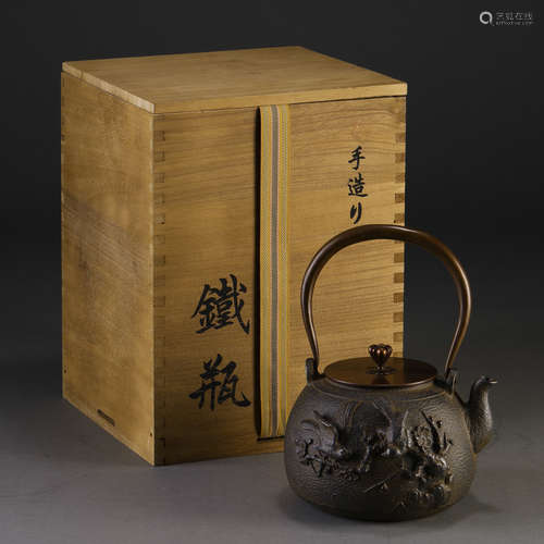 A Japanese Iron Teapot with Box