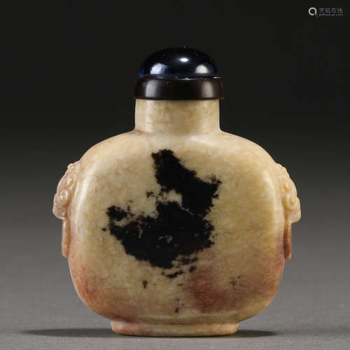 A Chinese Carved Jade Snuff Bottle