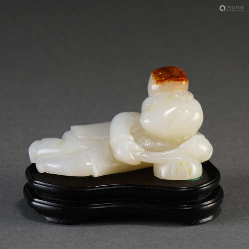 A Chinese Carved White Jade Figure