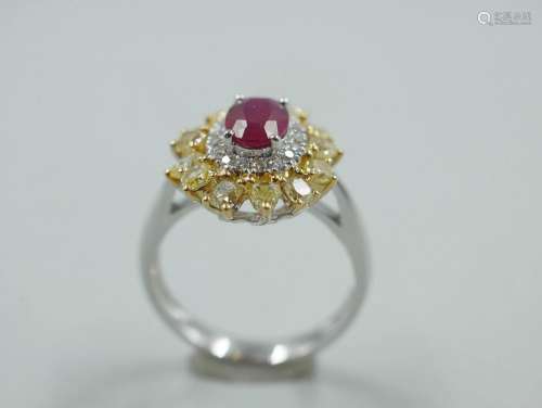 Bague fleur deux or 18k centrée d'un rubis taille ovale de 1...