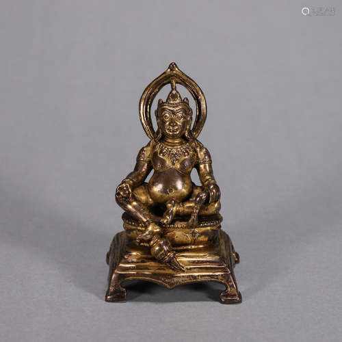 A gilding copper Tibetan yellow Jambhala statue