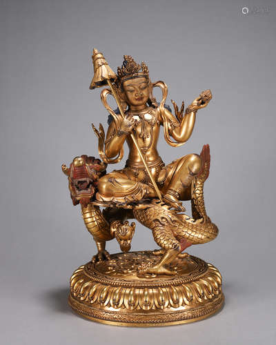 A gilding copper buddha statue