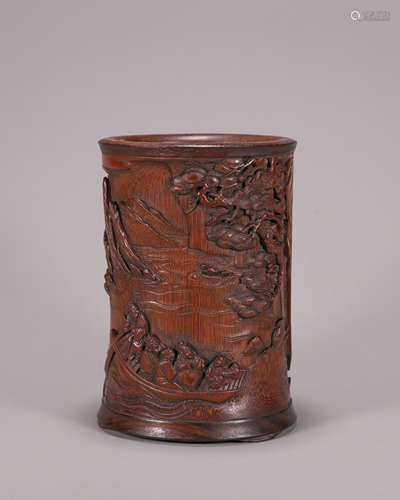 A figure carved bamboo brush pot