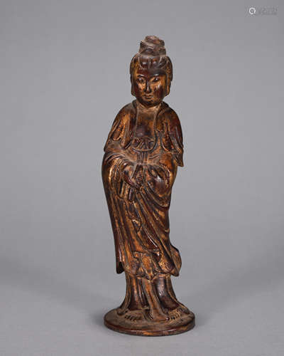 A gilt red sandalwood Guanyin statuette