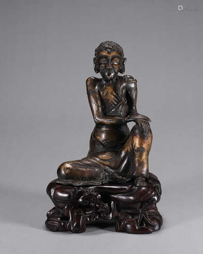 A gilding copper sadhu statuette