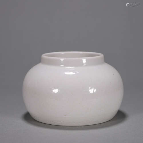 A white glazed flower carved porcelain jar