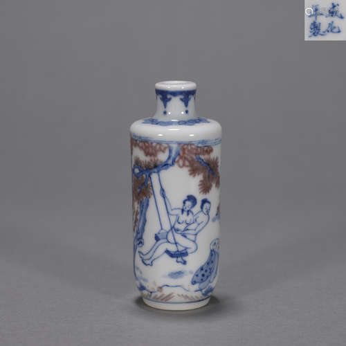 A blue and white underglaze red figure porcelain snuff bottl...