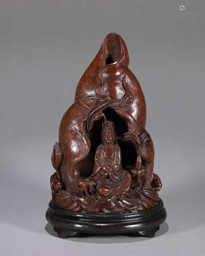 A wood carved Guanyin niche