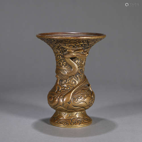 A dragon patterned copper vase