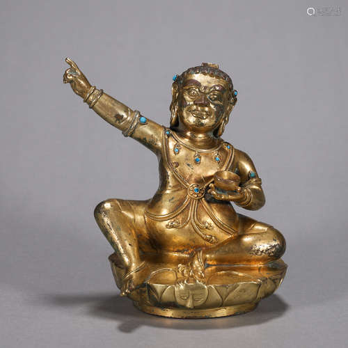 A gilding copper buddha statue