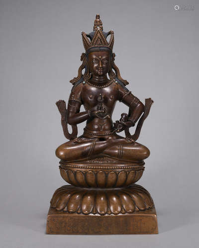 A silver-inlaid copper Vajrasattva statue