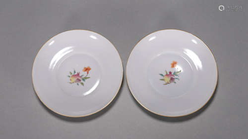 A pair of famille rose pomegranate porcelain plates