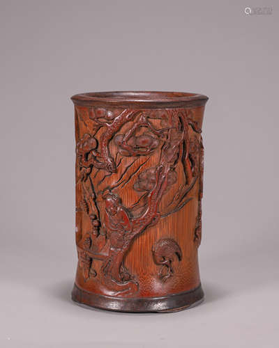 A pine and crane carved bamboo brush pot