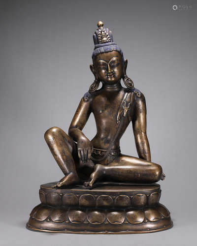 A silver-inlaid copper Guanyin bodhisattva statue