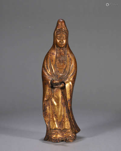 A gilt copper Guanyin statue