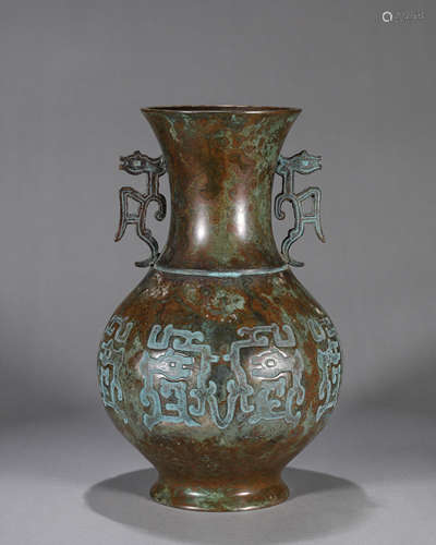 A dragon patterned double-eared copper vase