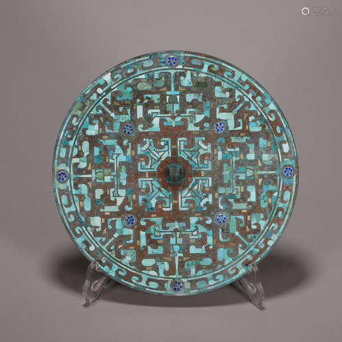 A turquoise-inlaid bronze mirror