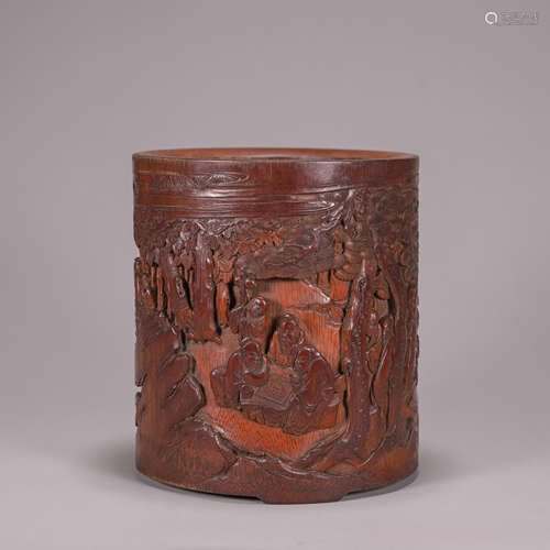 A figure carved bamboo brush pot