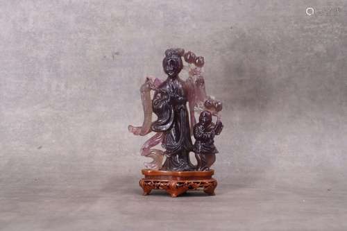 CHINE. Femme et enfant sculpté en pierre ro