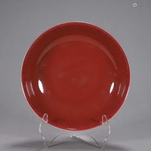 A red porcelain plate