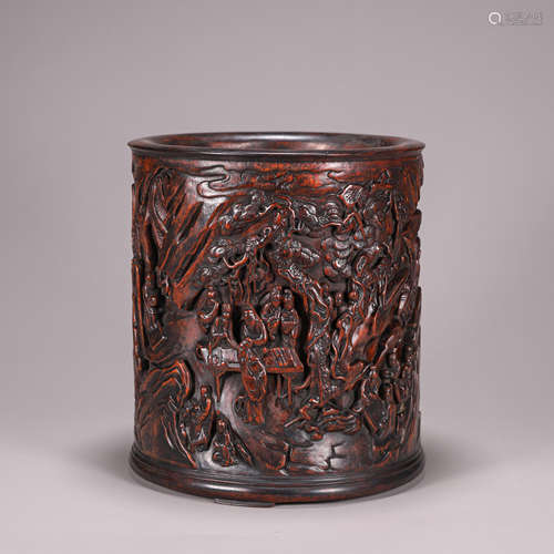 A figure carved bamboo brush pot