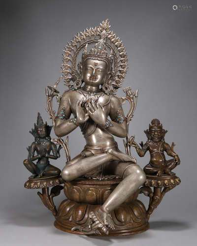 A silver Tibetan green tara statue